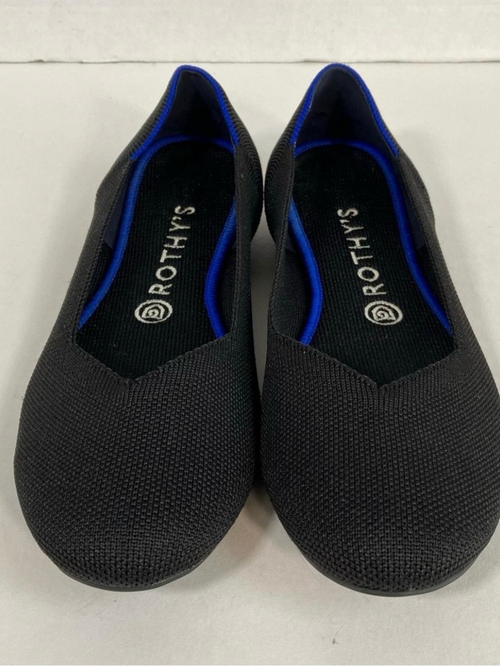 Rothy's Black Knit Slip-On Flats with Blue Trim